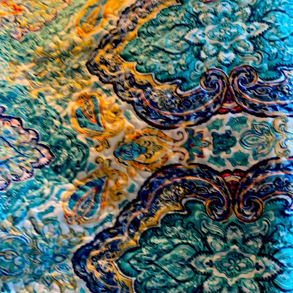 Mainstays double size quilt bright bright colors.    30 percent off